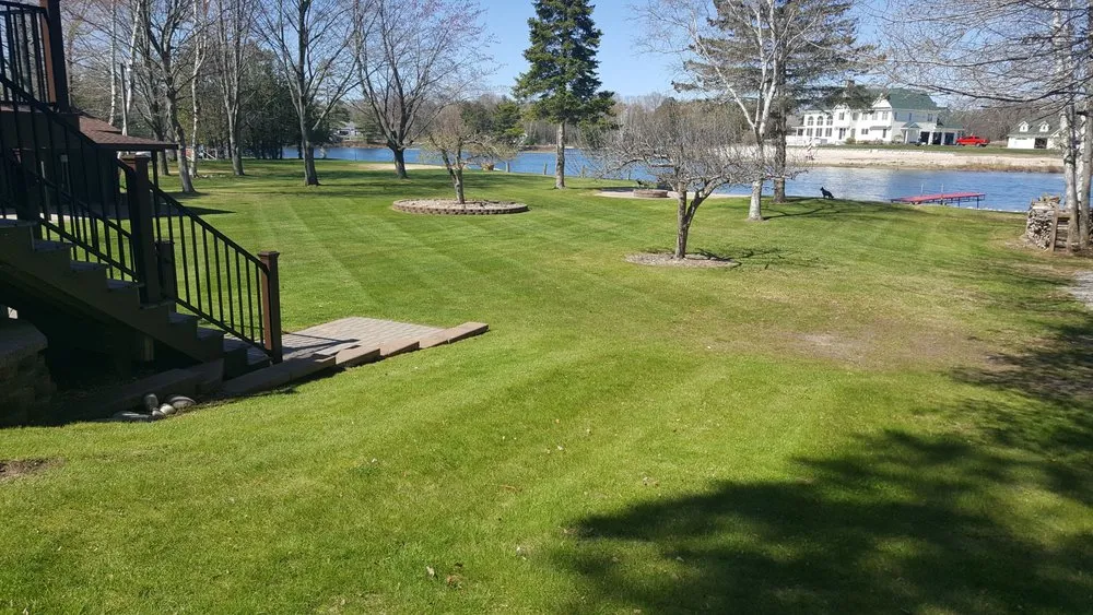 Expert yard cleanup service with custom design across Oscoda, MI - Howes Lawn Service