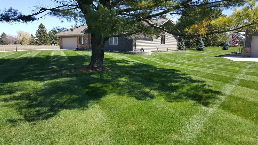 Trusted landscaping services in Oscoda, MI by Howes Lawn Service
