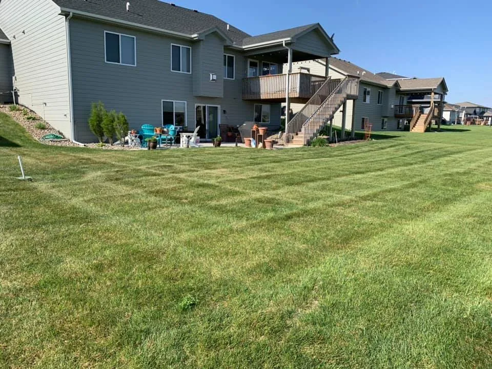 Custom garden landscaping for beautiful yards across Des Moines, IA - Howe’s Lawncare & Snow Removal