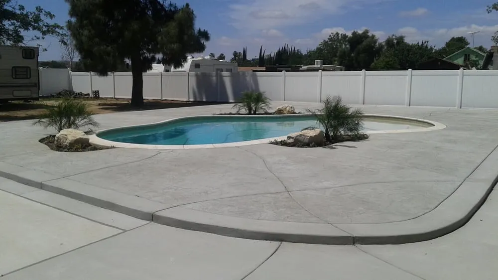 Professional lawn mowing service for residential properties in Redlands, CA by Hoy Construction Landscaping