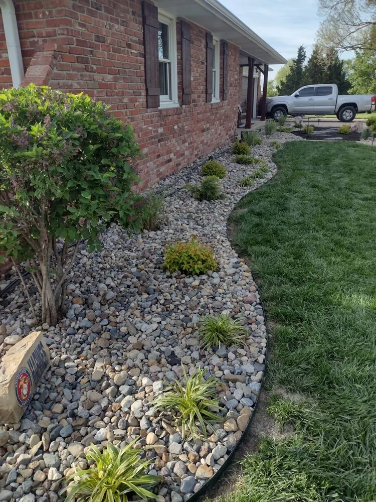 Professional lawn mowing service in Olathe, KS by H/Q landscape services