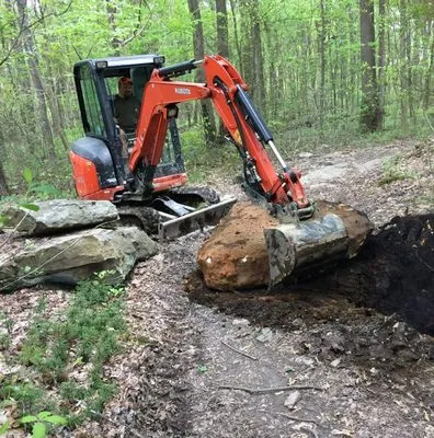 Hribal's Land Maintenance Logo