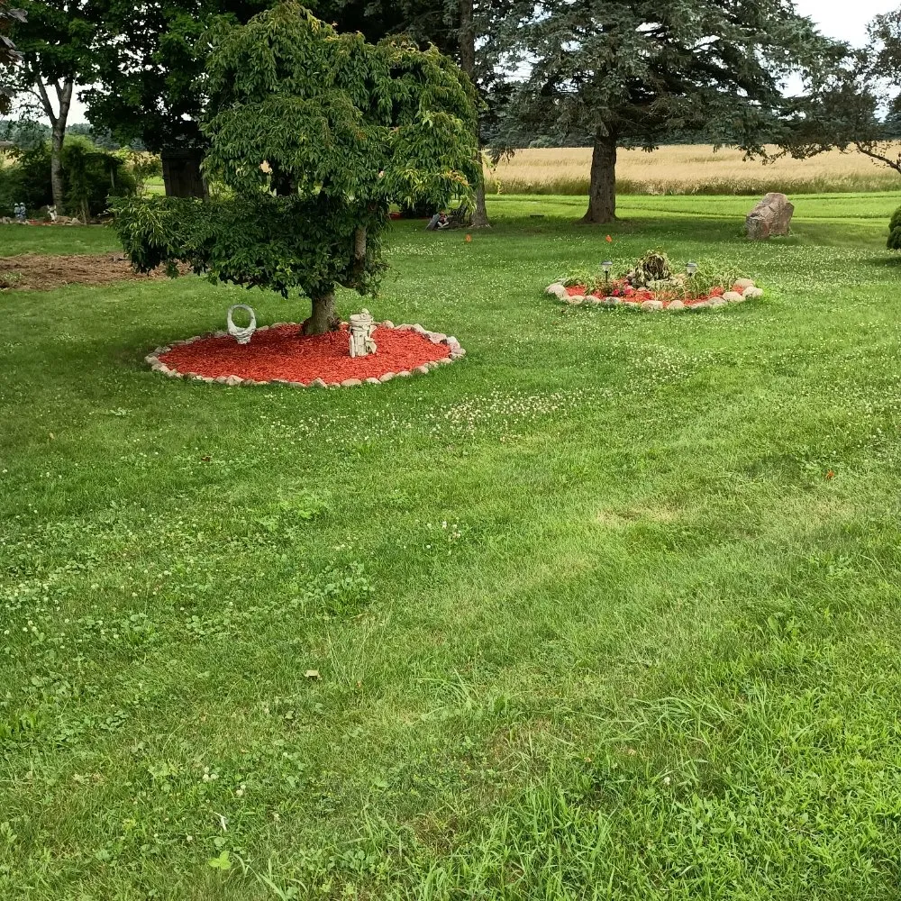 Professional landscaping services for outdoor upgrades across North Branch, MI - Hudson Hauling And Junk Removal