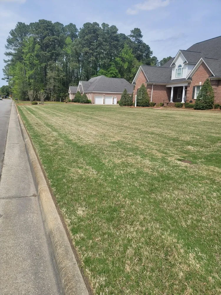 Reliable lawn mowing service for outdoor upgrades across Rocky Mount, NC - Hudson's Cuttings