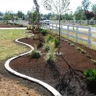 Reliable lawn care service with custom design in Rochester, WA by Huff Landscaping