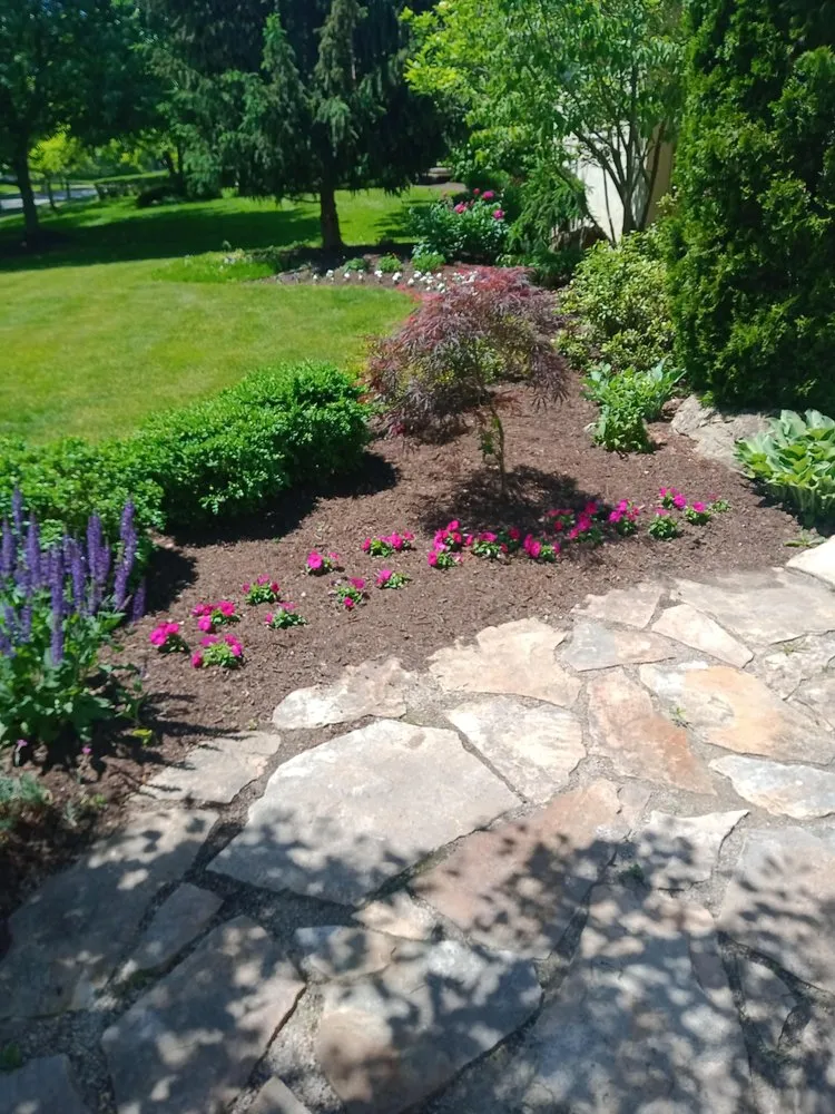 Professional outdoor landscaping for homes in Cleveland, OH by Huggins Lawn Care