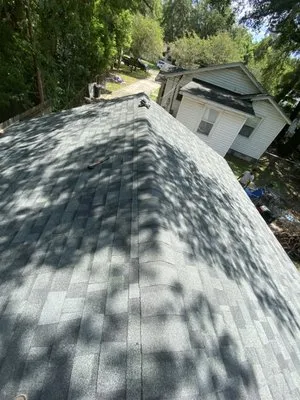 Huggins Top Tier Solutions Logo