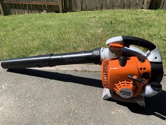 Huisman Lawn Care Logo