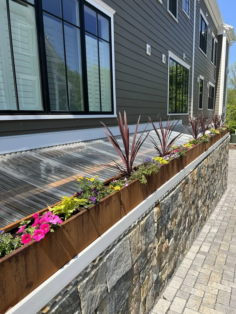 Expert lawn mowing service for outdoor upgrades in York, ME by Hultstrom's Landscaping