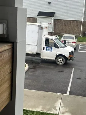 Hunt & Son's Lawn Maintenance Logo