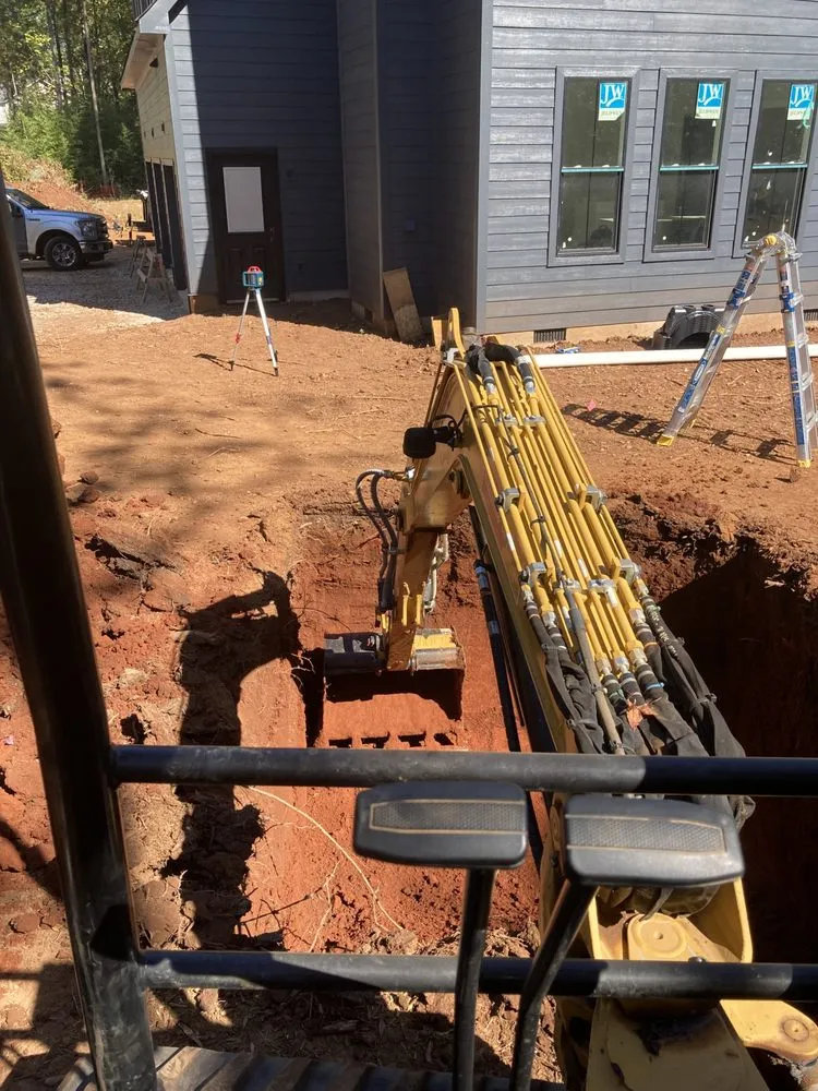 Expert yard cleanup service for residential properties in Charlotte, NC by Hunter Grounds Construction