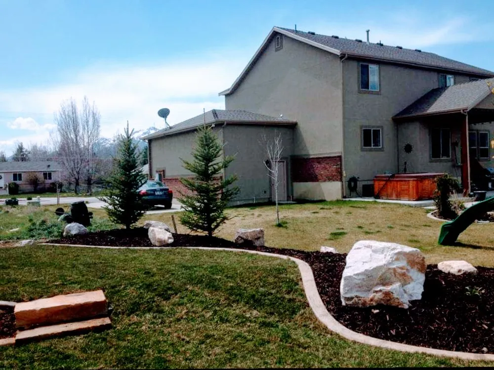 Custom yard maintenance for residential properties in Riverdale, UT by Hunters Care Lawn and Landscape