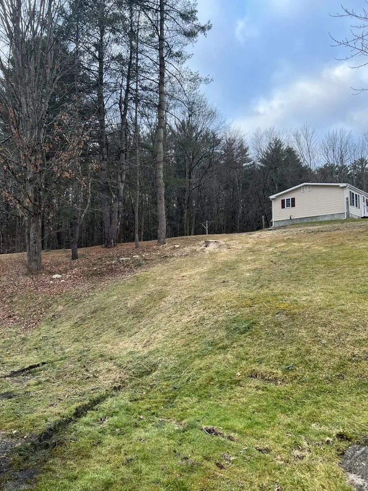 Custom landscaping services with custom design in Cambridge, NY by Hunts Property Management