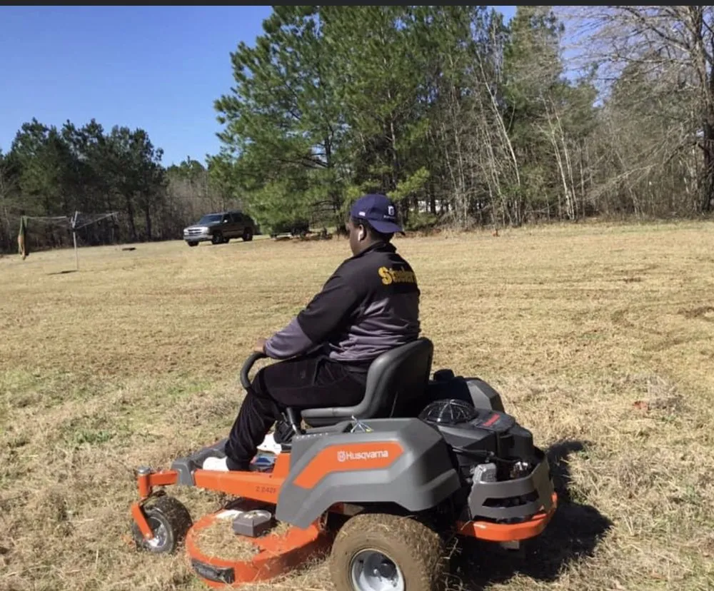 Trusted lawn mowing service for residential properties across Hopkins, SC - Hustle Husbands