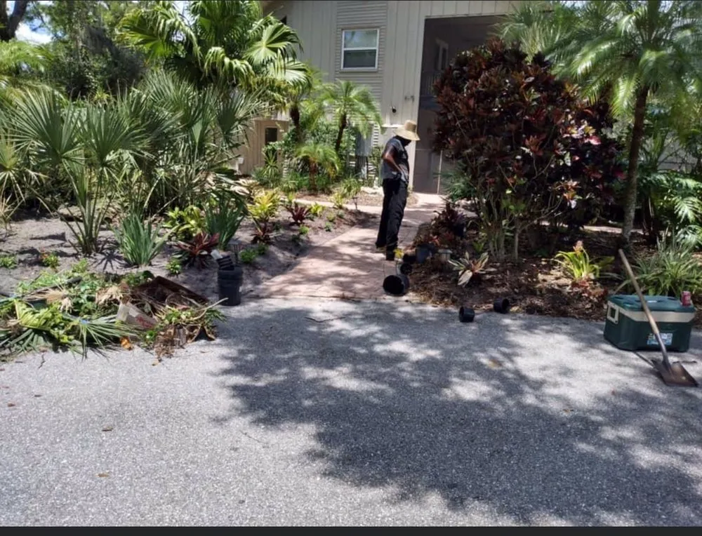 Reliable lawn mowing service for residential properties in North Port, FL by Hustlin Landscaping