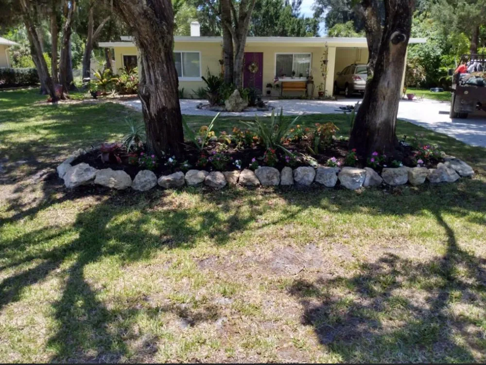 Affordable lawn care service with custom design across North Port, FL - Hustlin Landscaping