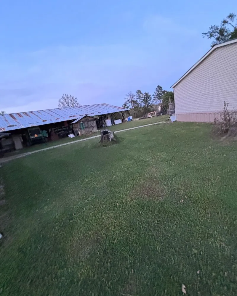 Custom landscape installation in Como, TX by I-A-J Lawn Cutz