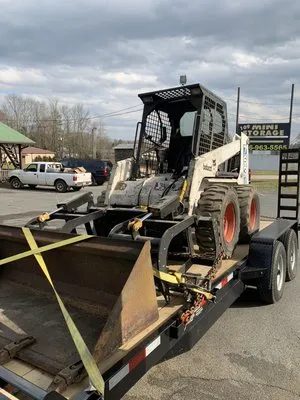 I Know a Guy Skid Steer Services Logo