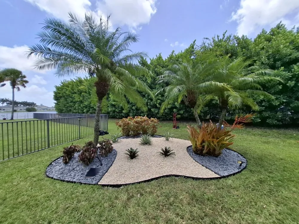 Expert yard maintenance for residential properties in Hollywood, FL by Ian and Kendall Landscaping