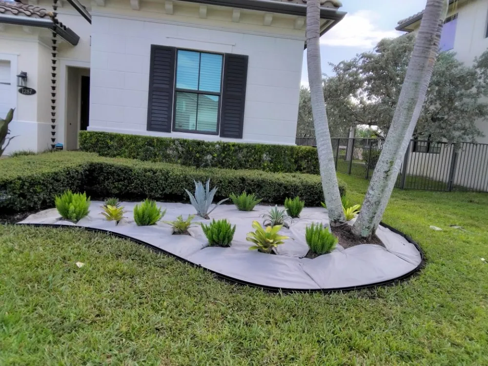 Custom garden landscaping for year-round maintenance in Hollywood, FL by Ian and Kendall Landscaping