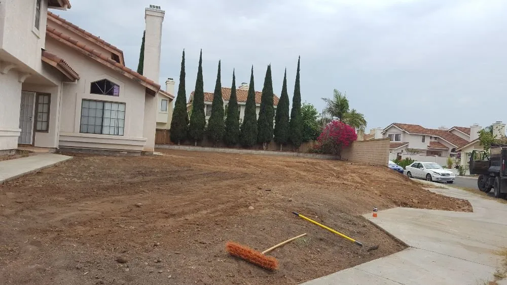 Top-rated garden landscaping experts serving San Diego, CA - IAN Myles Bobcat And Dump Truck