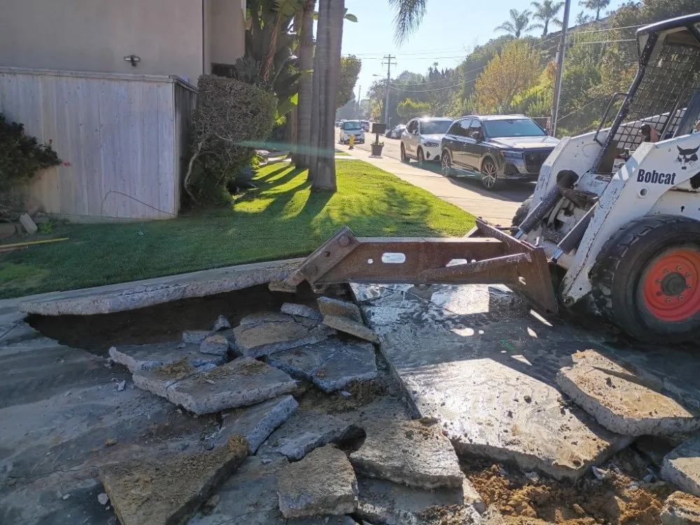 Professional yard cleanup service near you across San Diego, CA - IAN Myles Bobcat And Dump Truck