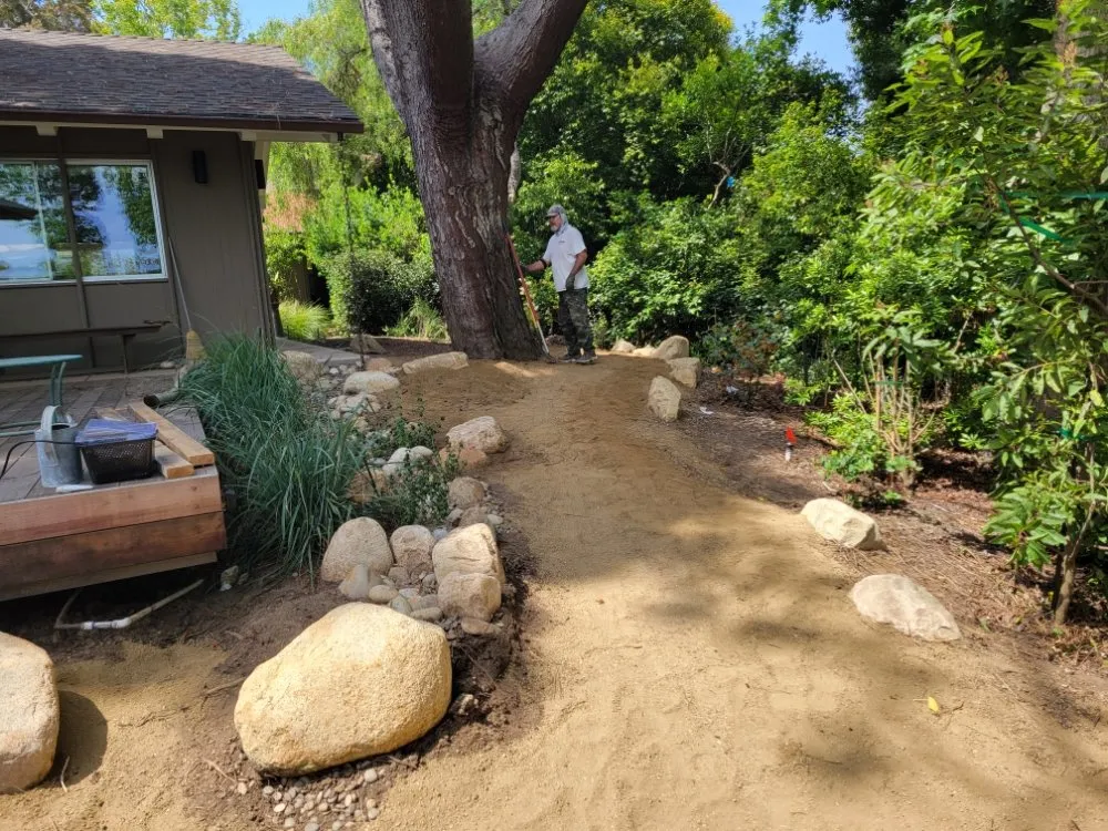 Affordable landscape design experts serving San Diego, CA - IAN Myles Bobcat And Dump Truck