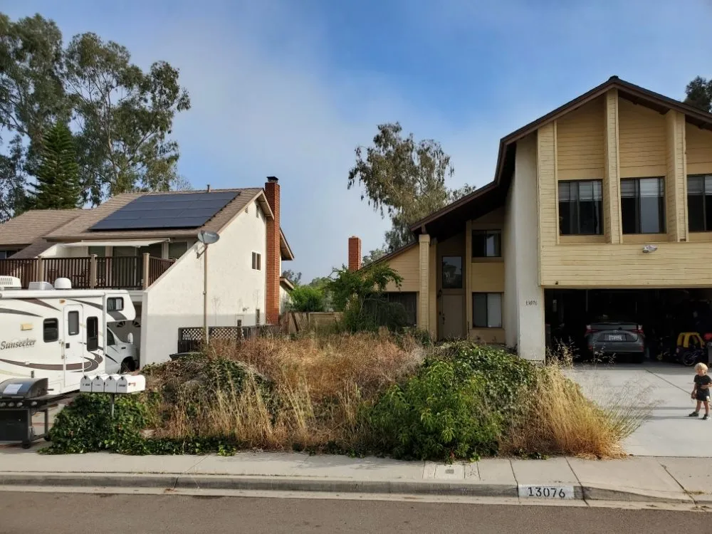 Expert yard cleanup service for residential properties in San Diego, CA by IAN Myles Bobcat And Dump Truck