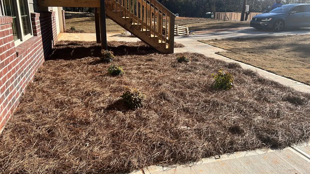 Custom landscape installation with custom design in Brookhaven, GA by Ians Construction
