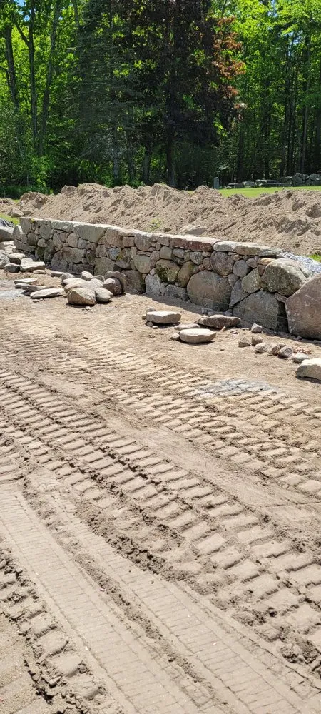 Local lawn mowing service near you across Townsend, MA - Iconic Rock Fieldstone Walls