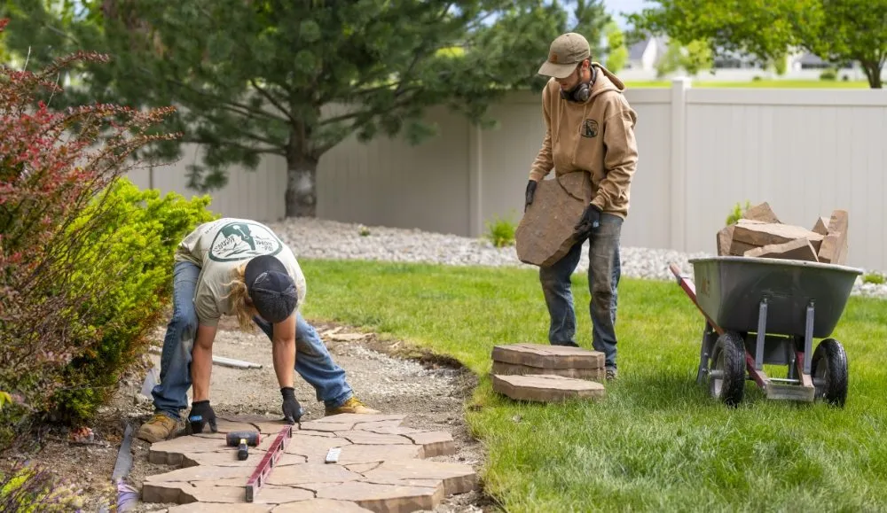 Affordable yard cleanup service for year-round maintenance across Cocolalla, ID - Ida-Home Hardscapes