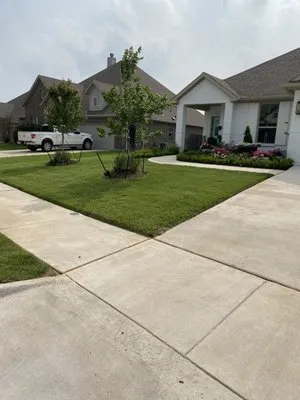 Ideal Lawn Care Logo