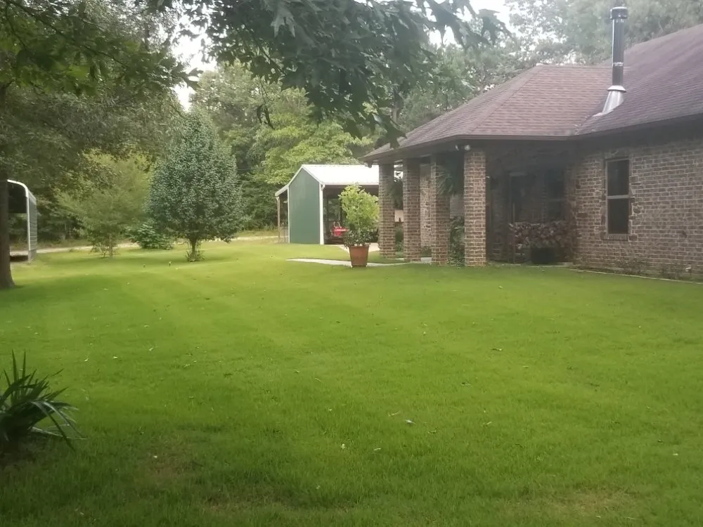 Custom landscaping services for homes in Harleton, TX by ii Care Lawn Care