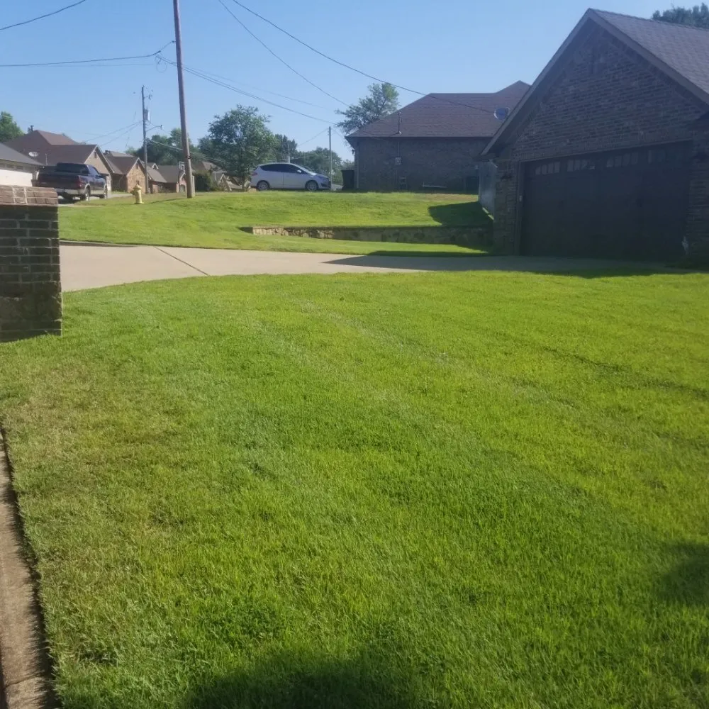 Custom landscape design in Harleton, TX by ii Care Lawn Care