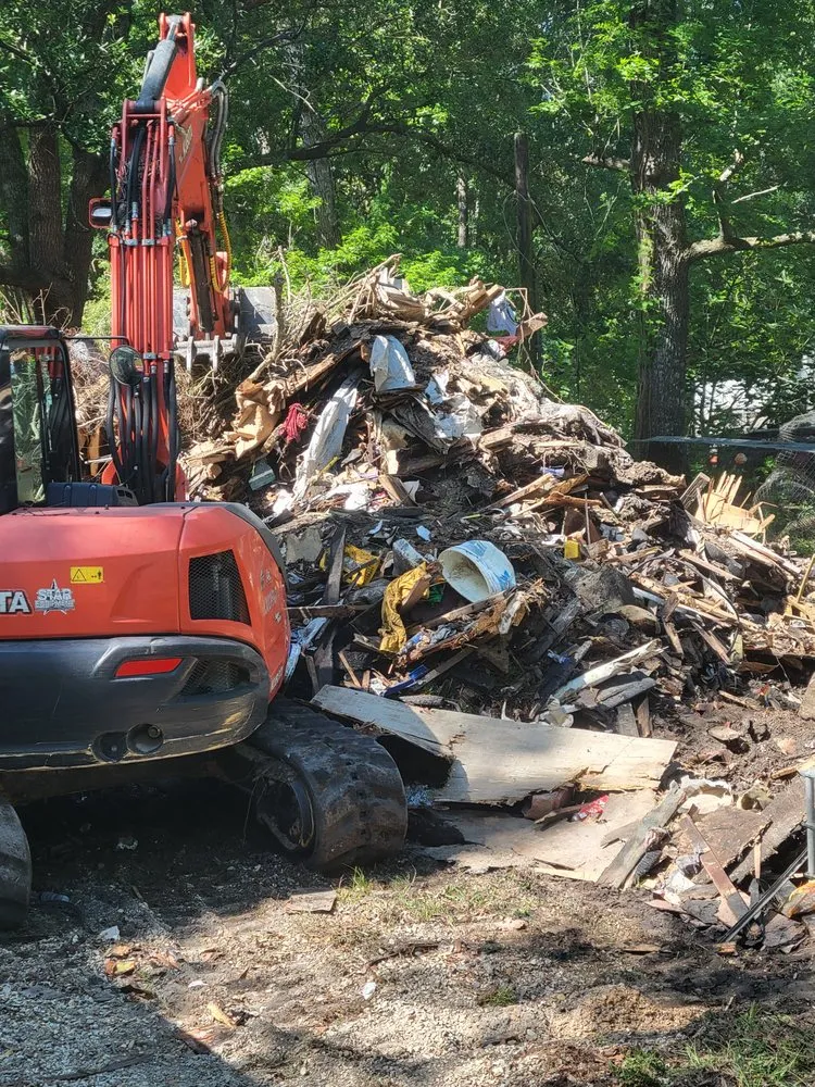 Custom landscape installation in Lacombe, LA by IL Trucking