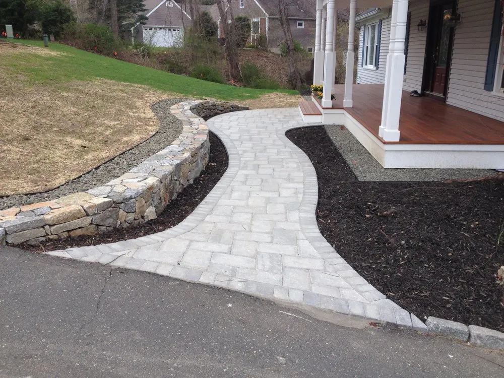 Professional lawn care service for residential properties in Brookfield, CT by Illescas construction