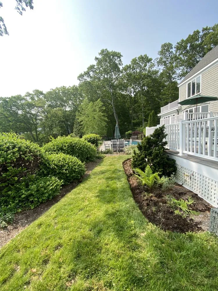 Custom yard maintenance for outdoor upgrades in Clinton, CT by Iluminado Landscamping