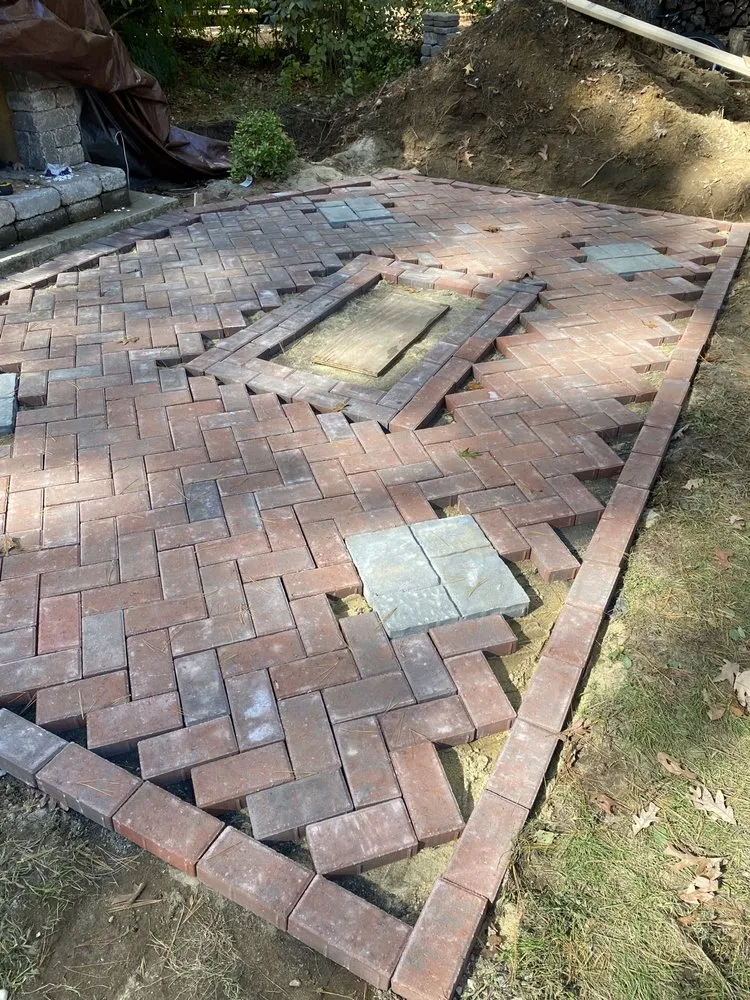 Custom landscape installation for outdoor upgrades in Stow, MA by Immaculate Home Services