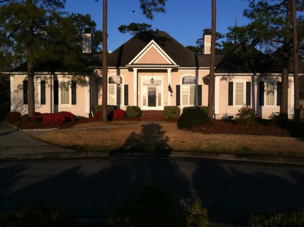 Professional yard cleanup service for year-round maintenance in Wilmington, NC by iMOW Lawn Services