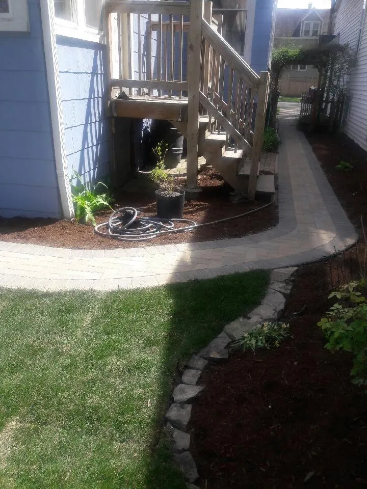 Professional lawn mowing service for year-round maintenance in Chicago, IL by Imperial Landscaping