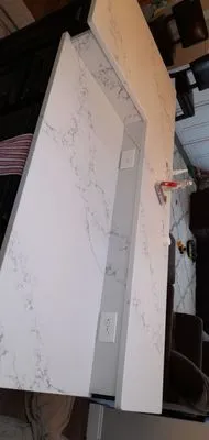 Imperial lawncare and Qualiti stone Logo