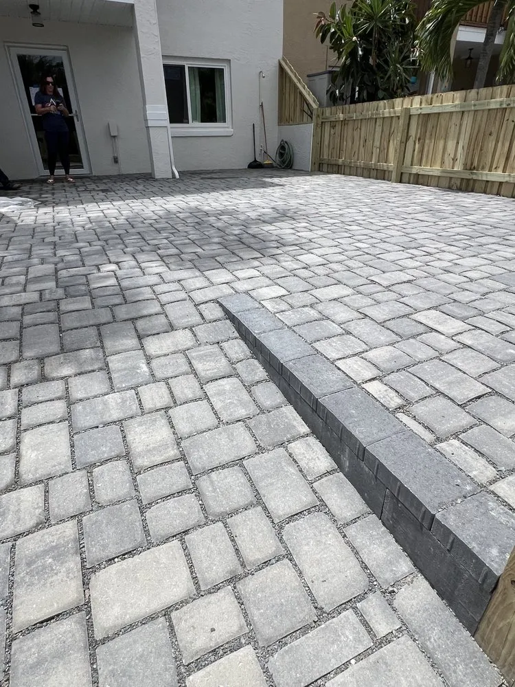 Custom yard cleanup service for year-round maintenance across Melbourne, FL - Imperium Pavers
