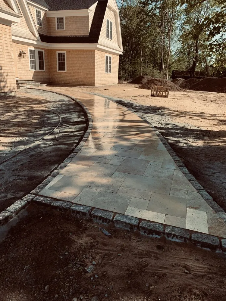 Top-rated lawn care service for year-round maintenance across Hyannis, MA - Impressive Construction & Landscaping