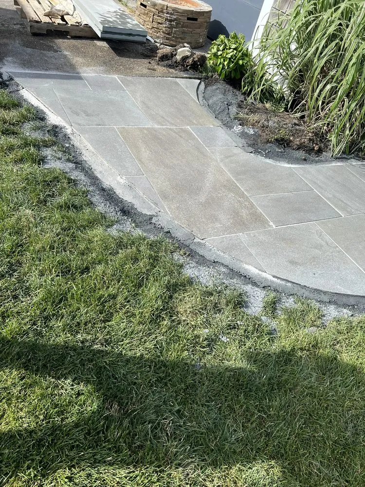 Top-rated lawn mowing service in Hyannis, MA by Impressive Construction & Landscaping