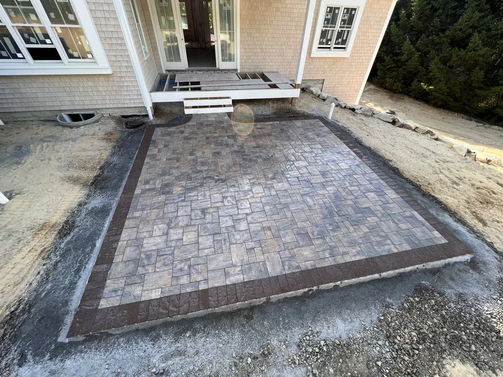 Custom lawn mowing service for outdoor upgrades across Hyannis, MA - Impressive Construction & Landscaping