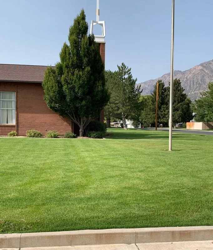 Professional lawn mowing service in Brigham City, UT by IMT companies
