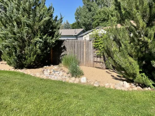 In & Out Landscaping Logo