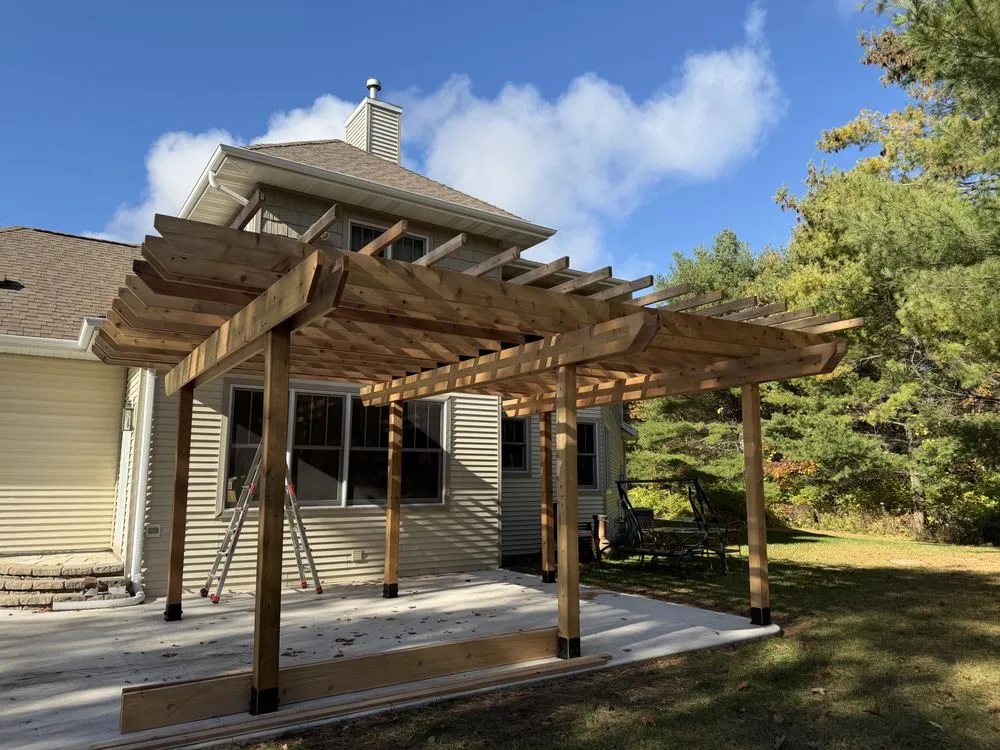 Local lawn mowing service with custom design across Luxemburg, WI - In & Out Solutions