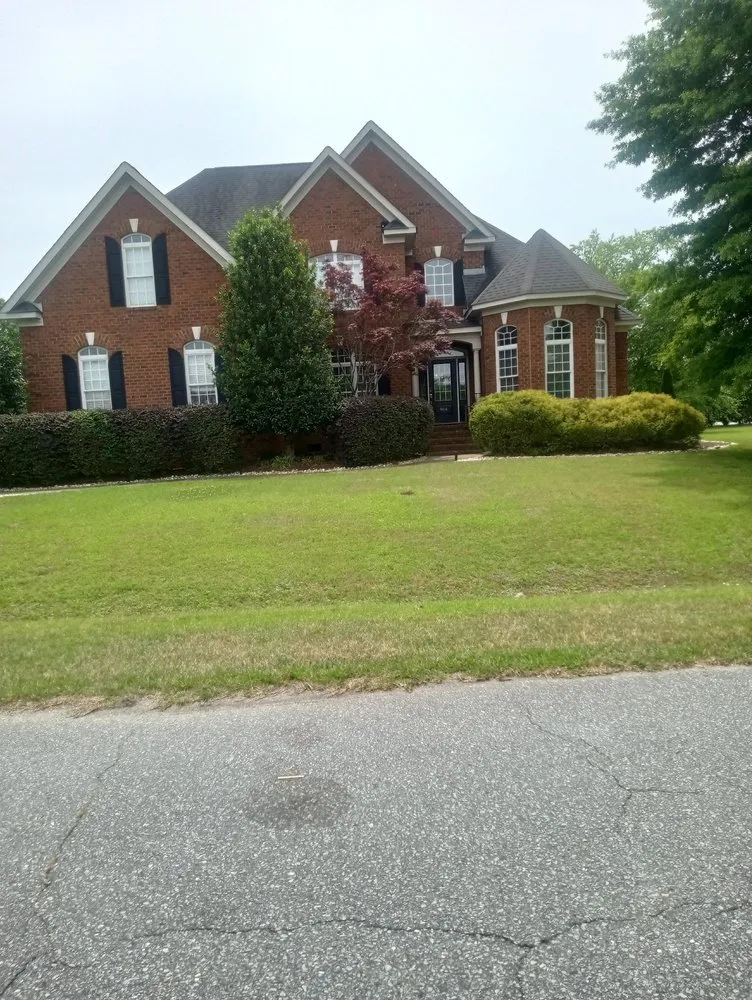 Expert outdoor landscaping with custom design in Greenville, NC by In A Nick Of Time Landscaping