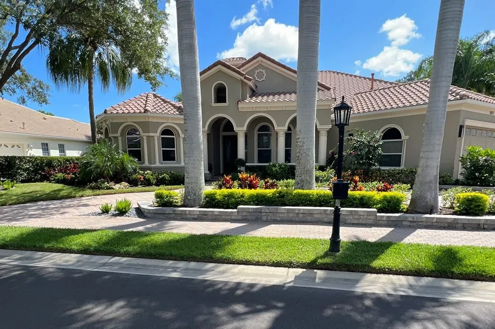 Custom landscape installation in Sarasota, FL by In Bloom Lawn & Landscape